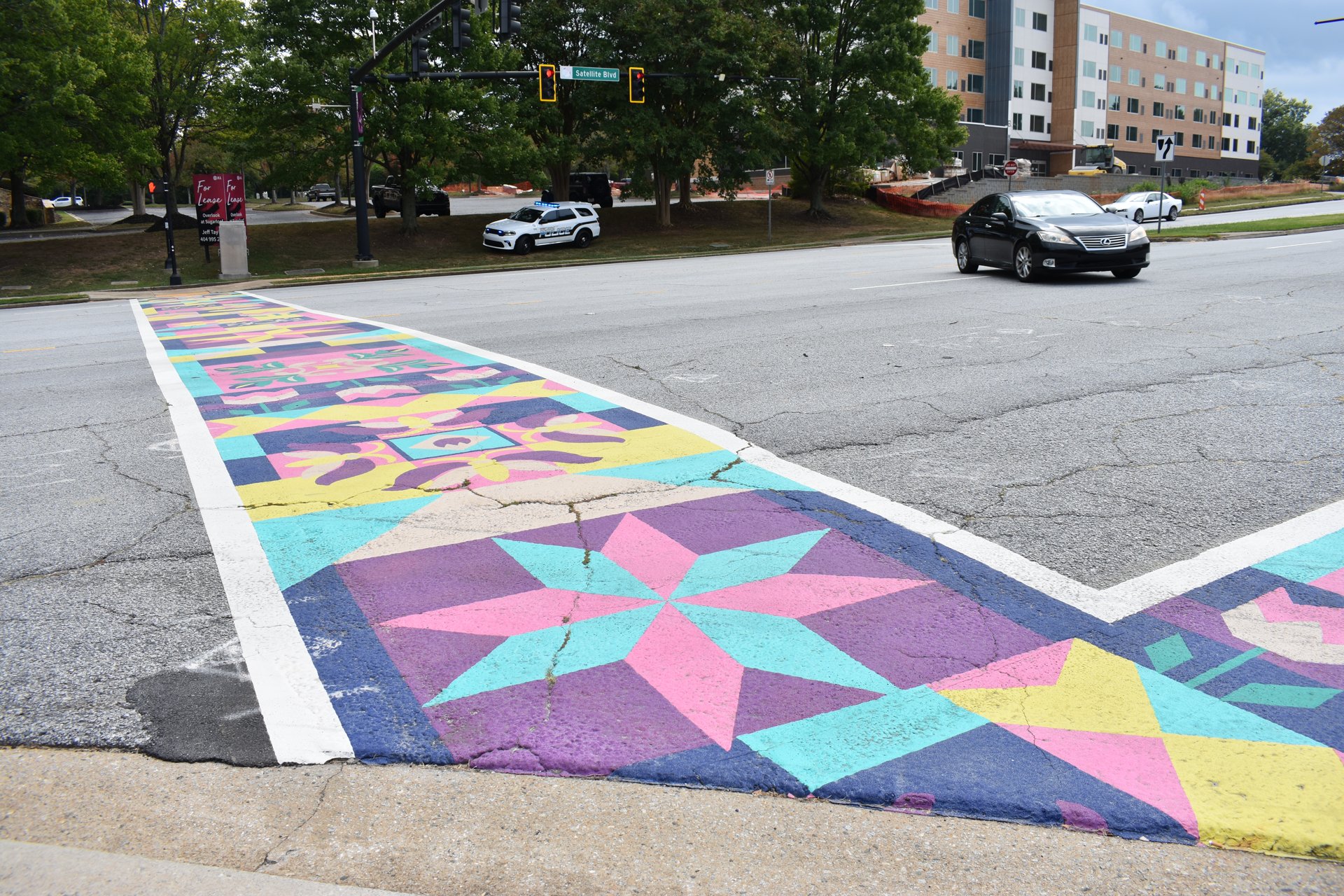 Quilt artistic crosswalk design at Gas South District