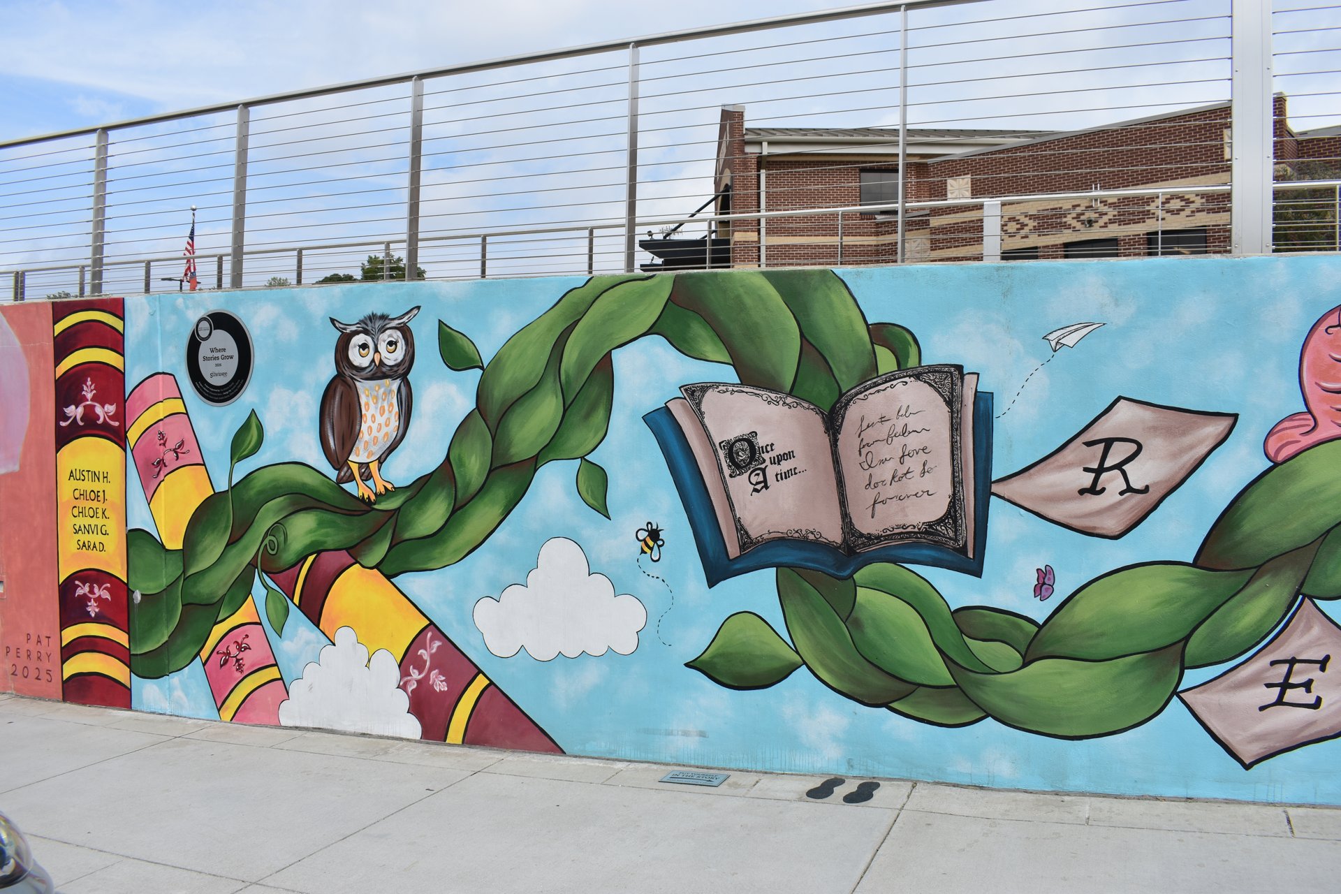 Books, flowers, and wildlife in the youth council’s Suwanee Library mural